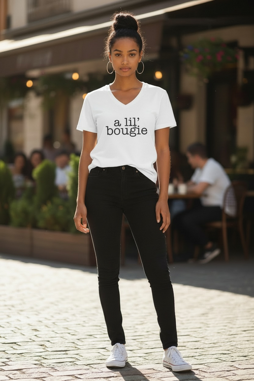 A Lil' Bougie V-Neck Tee in white worn by model outdoors