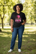 Model wearing a black Standing With a Warrior tee with pink ribbon design